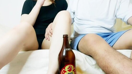 The guy drank some beer with his stepmom and started rubbing her clit, after which his mom jumped on his dick herself.
