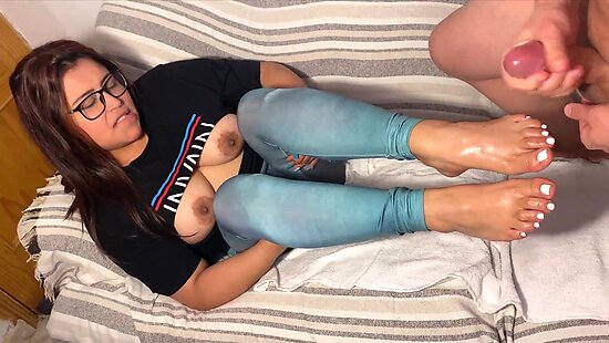 Footjob - Stepmom jerks off stepson with her feet